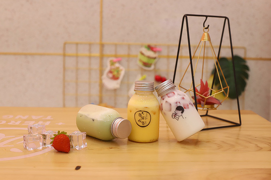 Kunststoffflaschen für Milchtee mit Griff zum Trinken mit Material und Effizienz