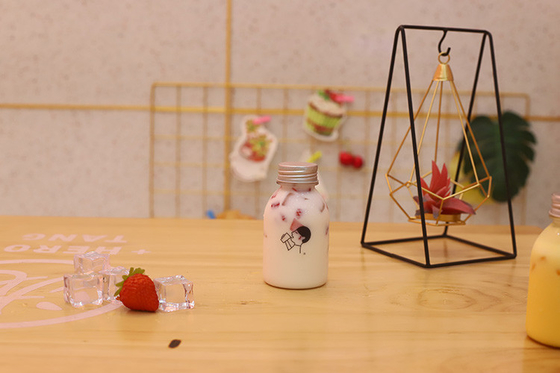 Kunststoffflaschen für Milchtee mit Griff zum Trinken mit Material und Effizienz