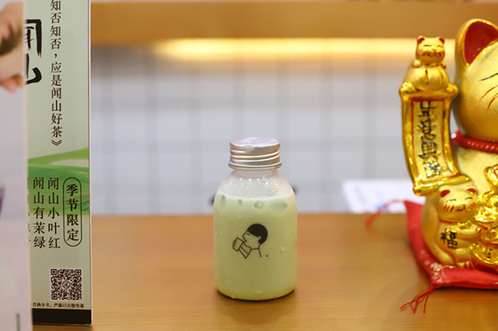 Kunststoffflaschen für Milchtee mit Griff zum Trinken mit Material und Effizienz
