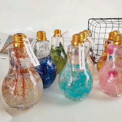 Attraktiv geformte Glühbirnenflasche mit Led 300 ml zum Safttrinken