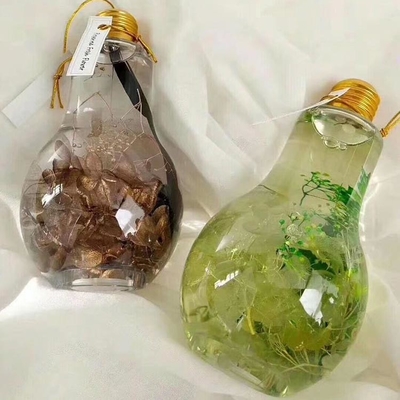 Attraktiv geformte Glühbirnenflasche mit Led 300 ml zum Safttrinken