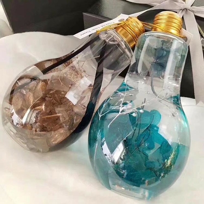 Attraktiv geformte Glühbirnenflasche mit Led 300 ml zum Safttrinken