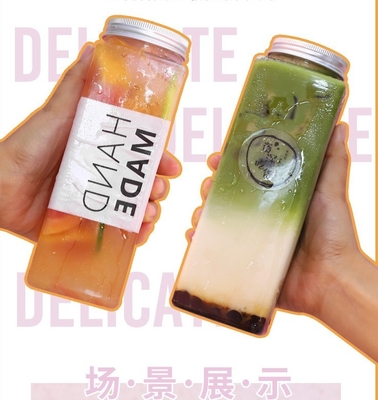 Moderne undichte Quadrat- und Rundmilch-Tee-Flaschen mit Griff