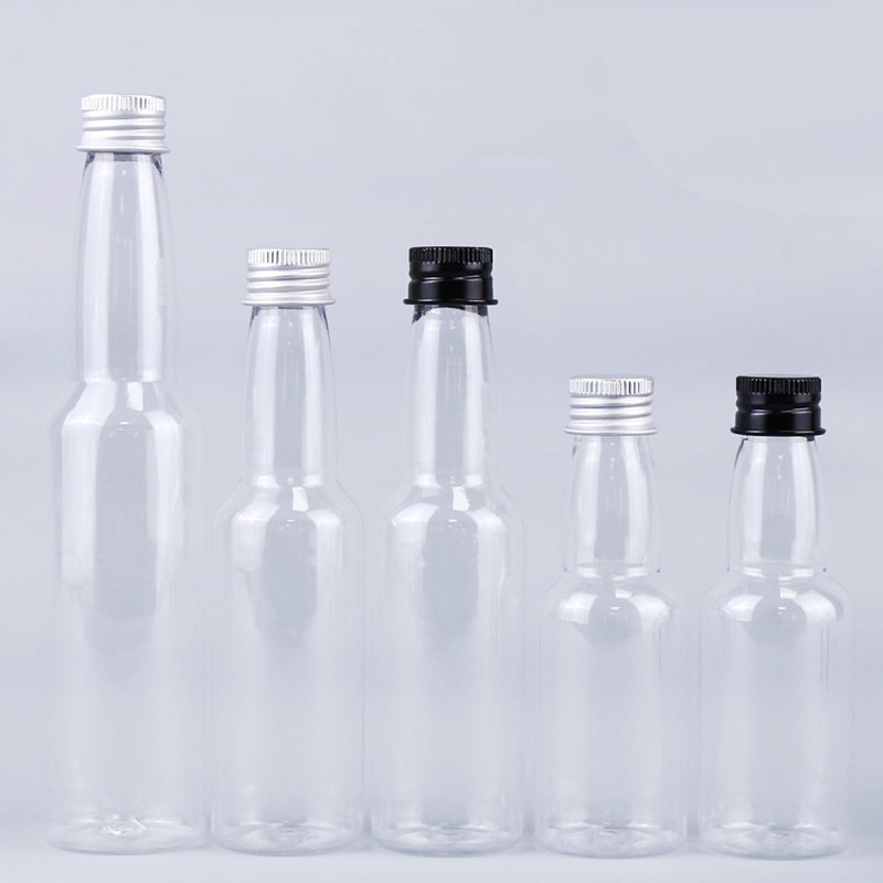 Warmverkauf 50 ml durchsichtige runde Kunststoff PET Spirituosen Flasche mit Aluminiumkappe