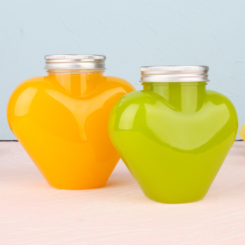 Moderne, undichte Milch-Tee-Flaschen in klaren Farben