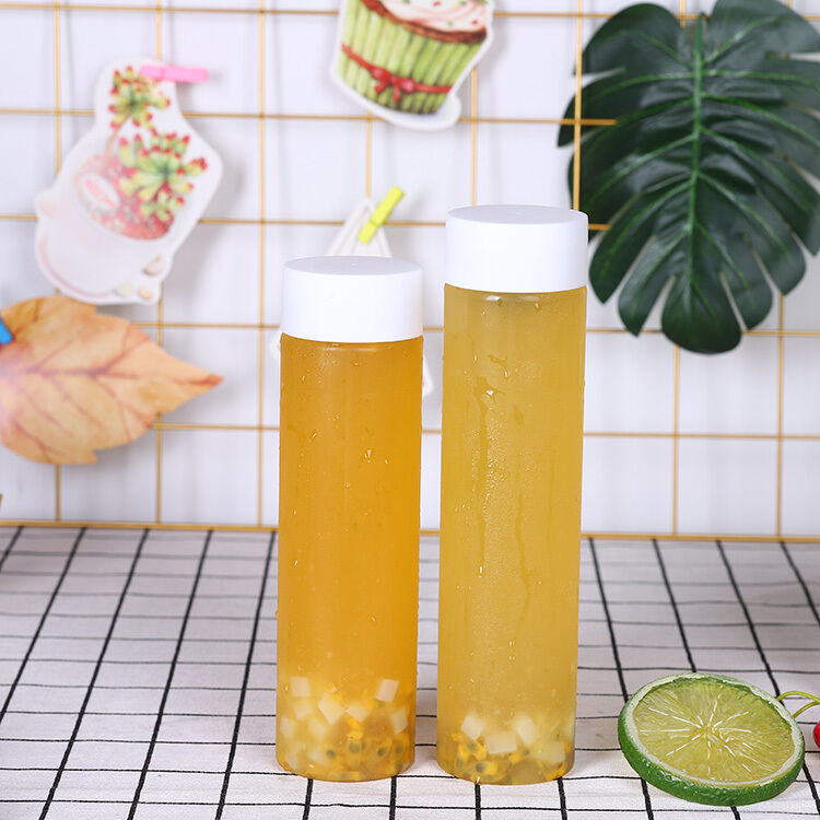 Handfläche Ja Milch-Tee-Flaschen 05kg Schraube auf Deckel undicht Design ideal für kommerzielle Getränke Verpackung und Vertrieb